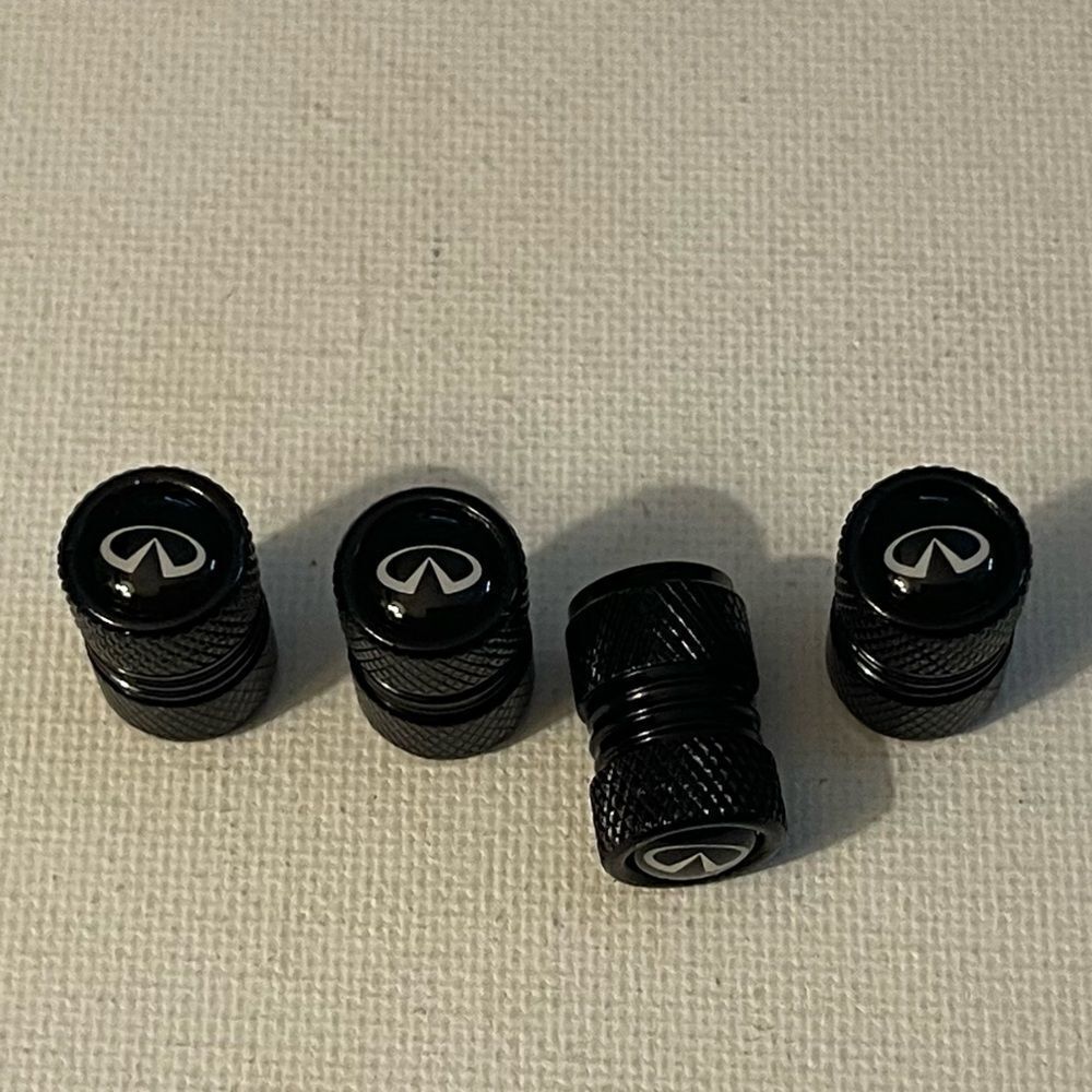 Infinity valve Stem caps in black set of 4 NWT